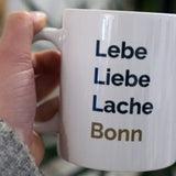 Tasse Lebe, Liebe, Lache Bonn - LudwigvanB.